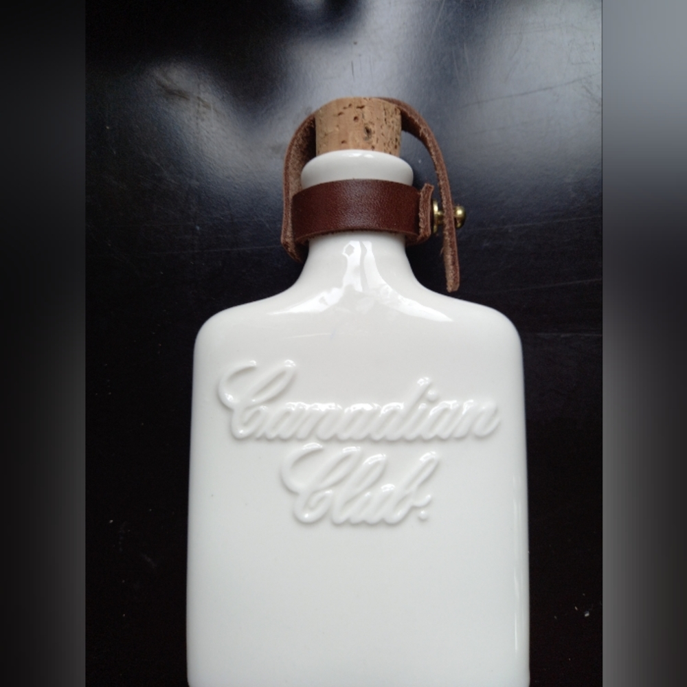 White ceramic mini Canada Club flask